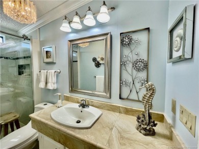 Exquisite home w/a lake & golf course view! Metal roof 3 yrs old on Indianwood Golf and Country Club in Florida - for sale on GolfHomes.com, golf home, golf lot