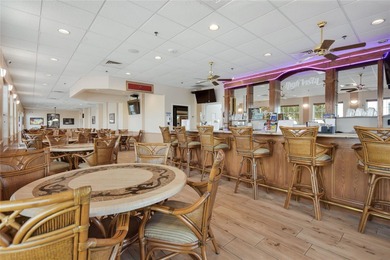 Under contract-accepting backup offers. One or more photo(s) has on Ridgewood Lakes Golf and Country Club in Florida - for sale on GolfHomes.com, golf home, golf lot