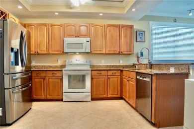 A BOATER'S LIFE COULD BE YOUR DREAM COME TRUE IN THIS BEAUTIFUL on Saint Andrews South Golf Club in Florida - for sale on GolfHomes.com, golf home, golf lot
