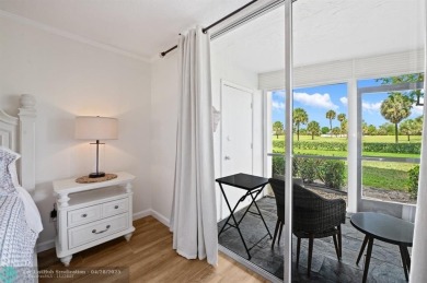 This updated condo features a spacious living area with an on Boca Dunes Golf and Country Club in Florida - for sale on GolfHomes.com, golf home, golf lot