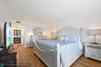 This updated condo features a spacious living area with an on Boca Dunes Golf and Country Club in Florida - for sale on GolfHomes.com, golf home, golf lot
