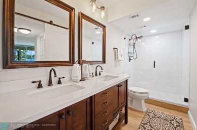 This updated condo features a spacious living area with an on Boca Dunes Golf and Country Club in Florida - for sale on GolfHomes.com, golf home, golf lot