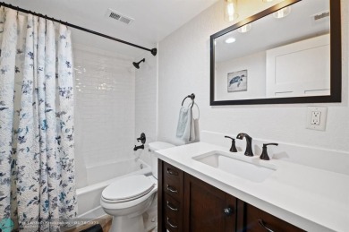 This updated condo features a spacious living area with an on Boca Dunes Golf and Country Club in Florida - for sale on GolfHomes.com, golf home, golf lot