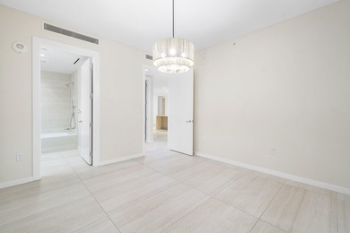 A rare & exclusive 2 bed plus den corner residence featuring a on Boca Raton Resort and Club in Florida - for sale on GolfHomes.com, golf home, golf lot