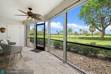 This updated condo features a spacious living area with an on Boca Dunes Golf and Country Club in Florida - for sale on GolfHomes.com, golf home, golf lot
