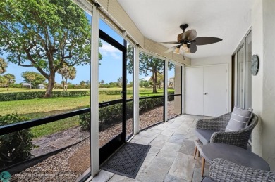 This updated condo features a spacious living area with an on Boca Dunes Golf and Country Club in Florida - for sale on GolfHomes.com, golf home, golf lot