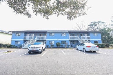 Welcome to 1301 Pidgen Rd Unit 1101, a beautiful first-floor end on Whispering Pines in South Carolina - for sale on GolfHomes.com, golf home, golf lot