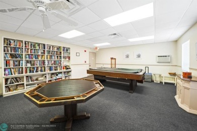 This updated condo features a spacious living area with an on Boca Dunes Golf and Country Club in Florida - for sale on GolfHomes.com, golf home, golf lot