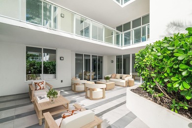 A rare & exclusive 2 bed plus den corner residence featuring a on Boca Raton Resort and Club in Florida - for sale on GolfHomes.com, golf home, golf lot