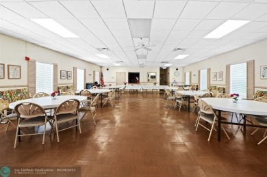 This updated condo features a spacious living area with an on Boca Dunes Golf and Country Club in Florida - for sale on GolfHomes.com, golf home, golf lot