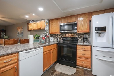 Welcome to 1301 Pidgen Rd Unit 1101, a beautiful first-floor end on Whispering Pines in South Carolina - for sale on GolfHomes.com, golf home, golf lot