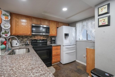 Welcome to 1301 Pidgen Rd Unit 1101, a beautiful first-floor end on Whispering Pines in South Carolina - for sale on GolfHomes.com, golf home, golf lot