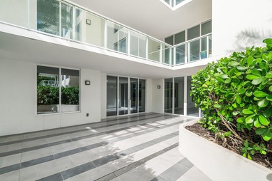 A rare & exclusive 2 bed plus den corner residence featuring a on Boca Raton Resort and Club in Florida - for sale on GolfHomes.com, golf home, golf lot
