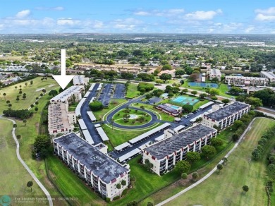 This updated condo features a spacious living area with an on Boca Dunes Golf and Country Club in Florida - for sale on GolfHomes.com, golf home, golf lot