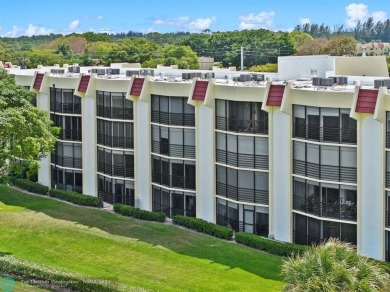 This updated condo features a spacious living area with an on Boca Dunes Golf and Country Club in Florida - for sale on GolfHomes.com, golf home, golf lot