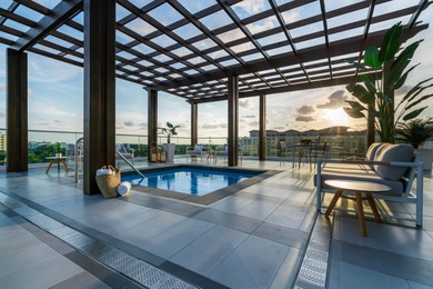 A rare & exclusive 2 bed plus den corner residence featuring a on Boca Raton Resort and Club in Florida - for sale on GolfHomes.com, golf home, golf lot