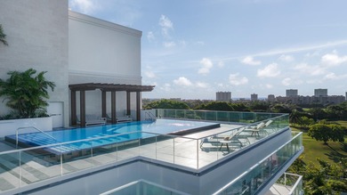 A rare & exclusive 2 bed plus den corner residence featuring a on Boca Raton Resort and Club in Florida - for sale on GolfHomes.com, golf home, golf lot