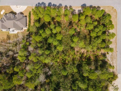 A magnificent wooded lot is approximately 1/2 acre lot and a on Legends Golf Club in South Carolina - for sale on GolfHomes.com, golf home, golf lot