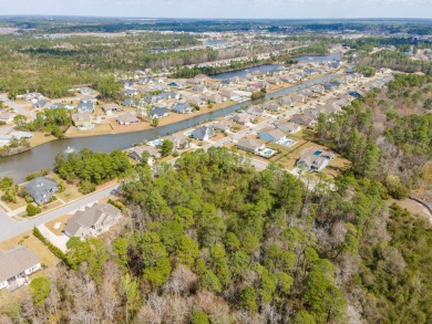 A magnificent wooded lot is approximately 1/2 acre lot and a on Legends Golf Club in South Carolina - for sale on GolfHomes.com, golf home, golf lot