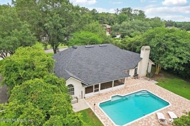 Updated POOL home in the gated community of Orange Park Country on Country Club of Orange Park in Florida - for sale on GolfHomes.com, golf home, golf lot
