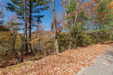 Discover a captivating 0.88-acre wooded lot with enhanced on Sapphire National Golf Club in North Carolina - for sale on GolfHomes.com, golf home, golf lot