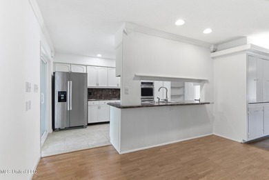 Welcome to 7922 Lanai Place, Diamondhead MS, a move-in ready on Diamondhead Country Club in Mississippi - for sale on GolfHomes.com, golf home, golf lot