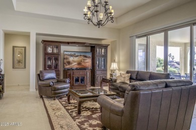 Make this magnificent Treviso model with enchanting water views on Tuscany Falls At Pebble Creek in Arizona - for sale on GolfHomes.com, golf home, golf lot