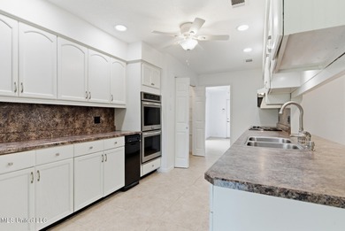 Welcome to 7922 Lanai Place, Diamondhead MS, a move-in ready on Diamondhead Country Club in Mississippi - for sale on GolfHomes.com, golf home, golf lot