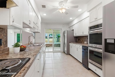 Welcome to 7922 Lanai Place, Diamondhead MS, a move-in ready on Diamondhead Country Club in Mississippi - for sale on GolfHomes.com, golf home, golf lot