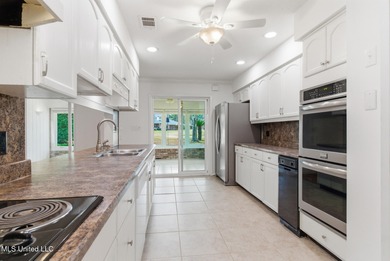 Welcome to 7922 Lanai Place, Diamondhead MS, a move-in ready on Diamondhead Country Club in Mississippi - for sale on GolfHomes.com, golf home, golf lot