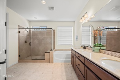 Make this magnificent Treviso model with enchanting water views on Tuscany Falls At Pebble Creek in Arizona - for sale on GolfHomes.com, golf home, golf lot