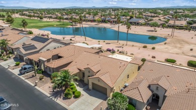 Make this magnificent Treviso model with enchanting water views on Tuscany Falls At Pebble Creek in Arizona - for sale on GolfHomes.com, golf home, golf lot