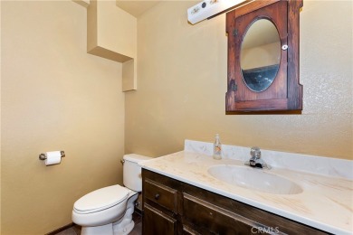 Seller is very motivated!  On a gentle sloping lot this very on Lake Arrowhead Country Club in California - for sale on GolfHomes.com, golf home, golf lot