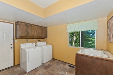 Seller is very motivated!  On a gentle sloping lot this very on Lake Arrowhead Country Club in California - for sale on GolfHomes.com, golf home, golf lot