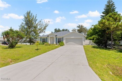 Lovely home in Southwest Cape Coral. Oversized, corner lot with on Royal Tee Country Club in Florida - for sale on GolfHomes.com, golf home, golf lot
