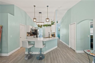 Lovely home in Southwest Cape Coral. Oversized, corner lot with on Royal Tee Country Club in Florida - for sale on GolfHomes.com, golf home, golf lot