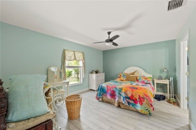Lovely home in Southwest Cape Coral. Oversized, corner lot with on Royal Tee Country Club in Florida - for sale on GolfHomes.com, golf home, golf lot