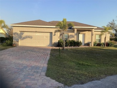 PRICE ADJUSTMENT! THIS IS A BEAUTIFUL OPEN FLOOR PLAN HOME IN on Deep Creek Golf Club in Florida - for sale on GolfHomes.com, golf home, golf lot