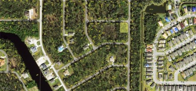 Residential lot in a growing area of Port Charlotte, offering on Sabal Trace Golf and Country Club in Florida - for sale on GolfHomes.com, golf home, golf lot