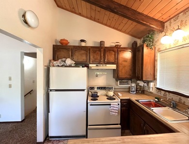 This home in the pines called 'Lil Oak Hill' is beautifully on Pine Mountain Lake Country Club in California - for sale on GolfHomes.com, golf home, golf lot