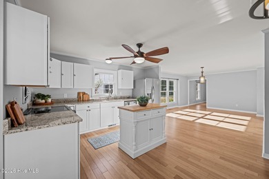 Welcome to this stately brick riverfront home nestled in the on River Bend Golf and Country Club in North Carolina - for sale on GolfHomes.com, golf home, golf lot