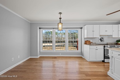 Welcome to this stately brick riverfront home nestled in the on River Bend Golf and Country Club in North Carolina - for sale on GolfHomes.com, golf home, golf lot