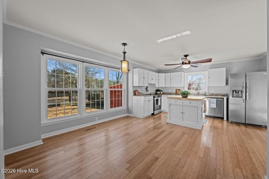 Welcome to this stately brick riverfront home nestled in the on River Bend Golf and Country Club in North Carolina - for sale on GolfHomes.com, golf home, golf lot