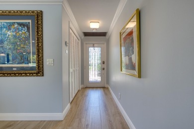 Beautifully remodeled spacious open floor plan located on the on Quail Ridge Golf Course and Country Club in Florida - for sale on GolfHomes.com, golf home, golf lot