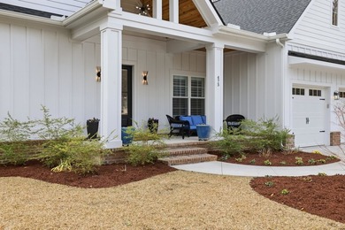 Set within the gated elegance of Pawleys Plantation Golf & on Pawleys Plantation Golf and Country Club in South Carolina - for sale on GolfHomes.com, golf home, golf lot