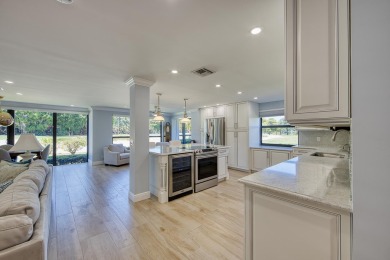 Beautifully remodeled spacious open floor plan located on the on Quail Ridge Golf Course and Country Club in Florida - for sale on GolfHomes.com, golf home, golf lot