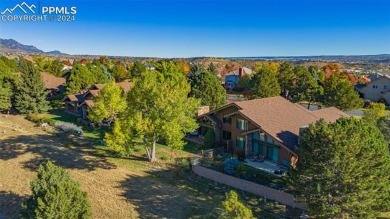 Nestled in the prestigious Kissing Camels community, this on Kissing Camels Golf Course in Colorado - for sale on GolfHomes.com, golf home, golf lot