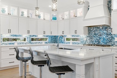 Set within the gated elegance of Pawleys Plantation Golf & on Pawleys Plantation Golf and Country Club in South Carolina - for sale on GolfHomes.com, golf home, golf lot