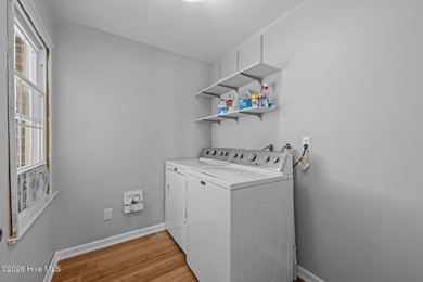 Welcome to this stately brick riverfront home nestled in the on River Bend Golf and Country Club in North Carolina - for sale on GolfHomes.com, golf home, golf lot