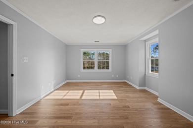 Welcome to this stately brick riverfront home nestled in the on River Bend Golf and Country Club in North Carolina - for sale on GolfHomes.com, golf home, golf lot